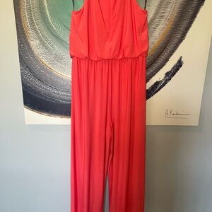 Elegant Coral Jumpsuit by Vince Camuto. Gold plated neck adornment.
